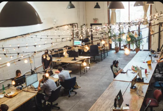 Founders discussing plans in a coworking hub